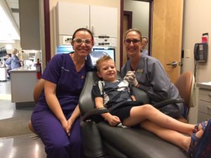 Dr. Jeanette MacLean, Knox Urschel, and dental assistant Stacy K Serna reunite